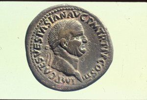 Moneda imperial que representa al emperador Vespasiano (bronce)